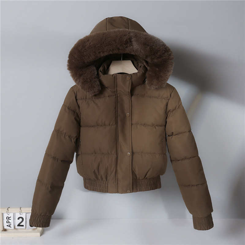 2025 nuevo abrigo de algodón de pluma para mujeres invierno corto de algodón grueso estilo coreano suelto chaqueta de algodón con capuchón pequeña moda