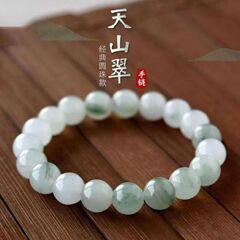 天然天山翠玉のブレスレットの女性の金は新疆の金糸玉の白玉の丸い玉が漂っています。