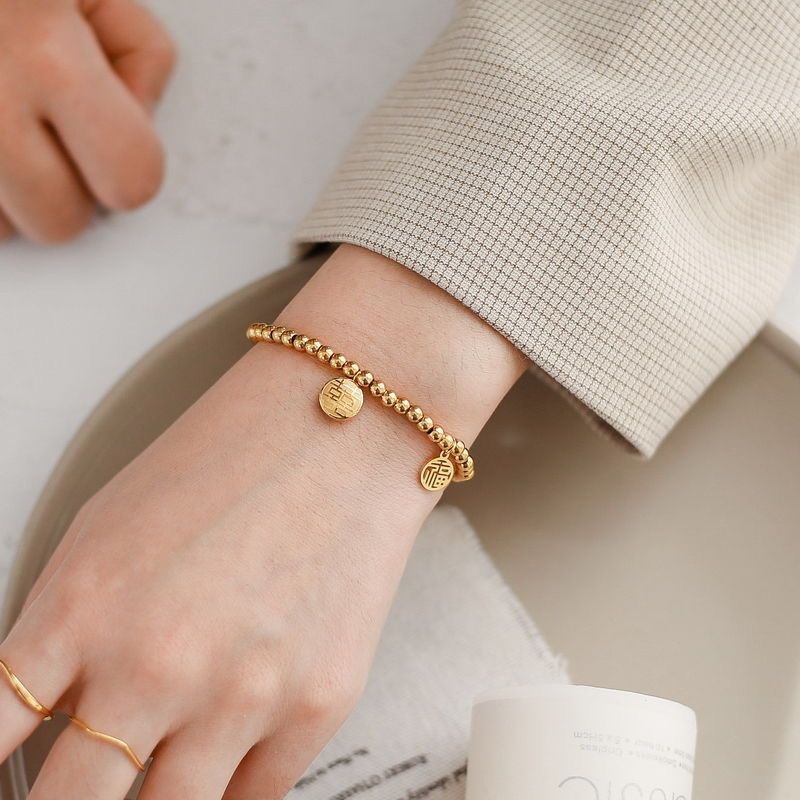 De Acero de titanio de color de retención de oro rosa pulsera de la suerte de la mujer rojo neto mismo estilo de todos los partidos de moda pulsera de moda accesorios de moda