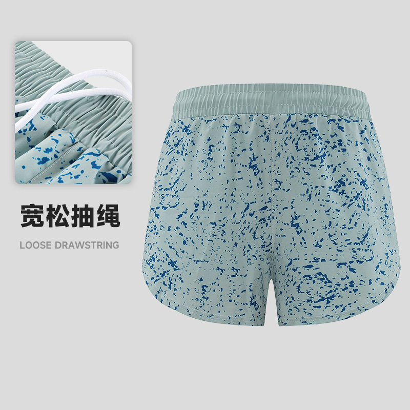 Nuevos pantalones cortos deportivos de poliéster casual al aire libre para correr yoga fitness pantalones de tres puntos de verano Pantalones cortos de secado rápido para mujeres