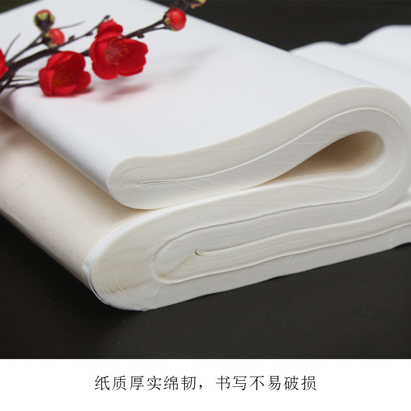 Wholesale four-foot white antique-style Xuan paper, thickened semi-raw, for beginners' calligraphy practice, brush painting, and small regular script practice.