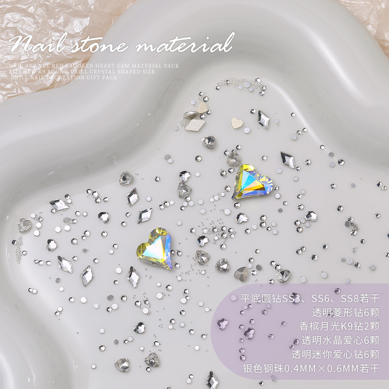 Arte de uñas celebridad en línea corazón torcido gema material paquete nuevo K9 cristal de diamante redondo tamaño especial en forma de diamante decoraciones de uñas al por mayor