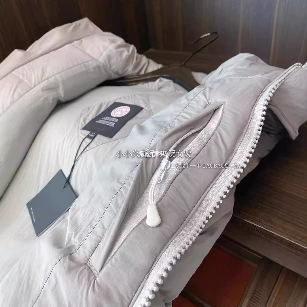 Down jacket, vest, warm capsule with down, white clothing