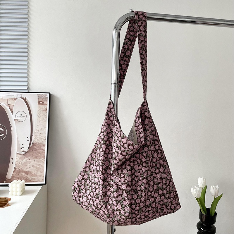 Diseño nicho bolsas de lona para mujeres 2025 nueva gran capacidad coreana estampado de leopardo flor de hombro impresa bolsas de mujer