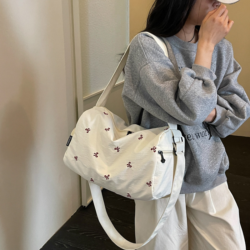 批发简约休闲百搭斜挎包女大学生上课通勤手提旅行包单肩托特包包产品实拍图