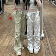 白い花のカジュアルな散歩の曲がった山本のズボンの女性の春夏の新型の高い腰の垂直感のまっすぐな筒の広い足のズボンの越境の卸売り