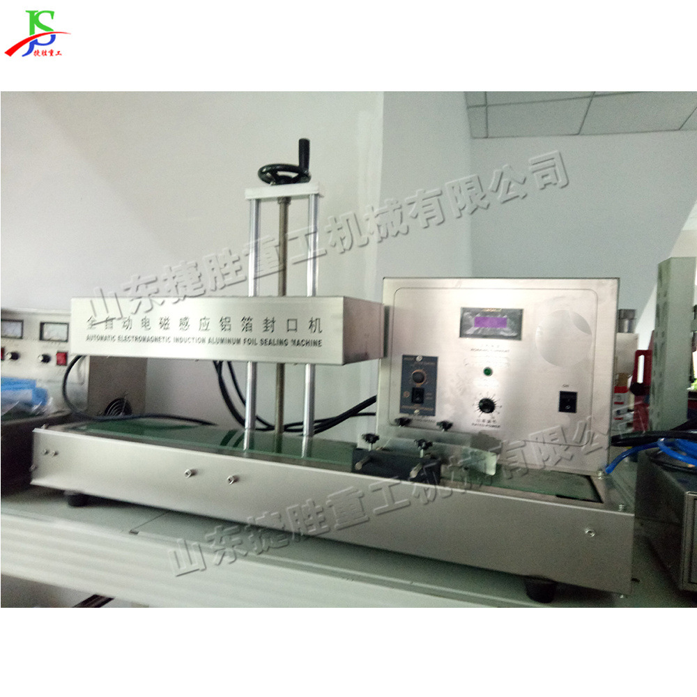 Máquina de sellado automático de aluminio de inducción electromagnética máquina de envasado de manguera de plástico compuesto horizontal máquina de envasado de botellas de plástico