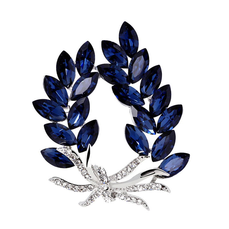 Nuevo cristal Bauhinia bouhinia broche de gama alta temperamento femenino anti-exposición pin diamante incrustado oído de trigo ramillete traje Accesorios