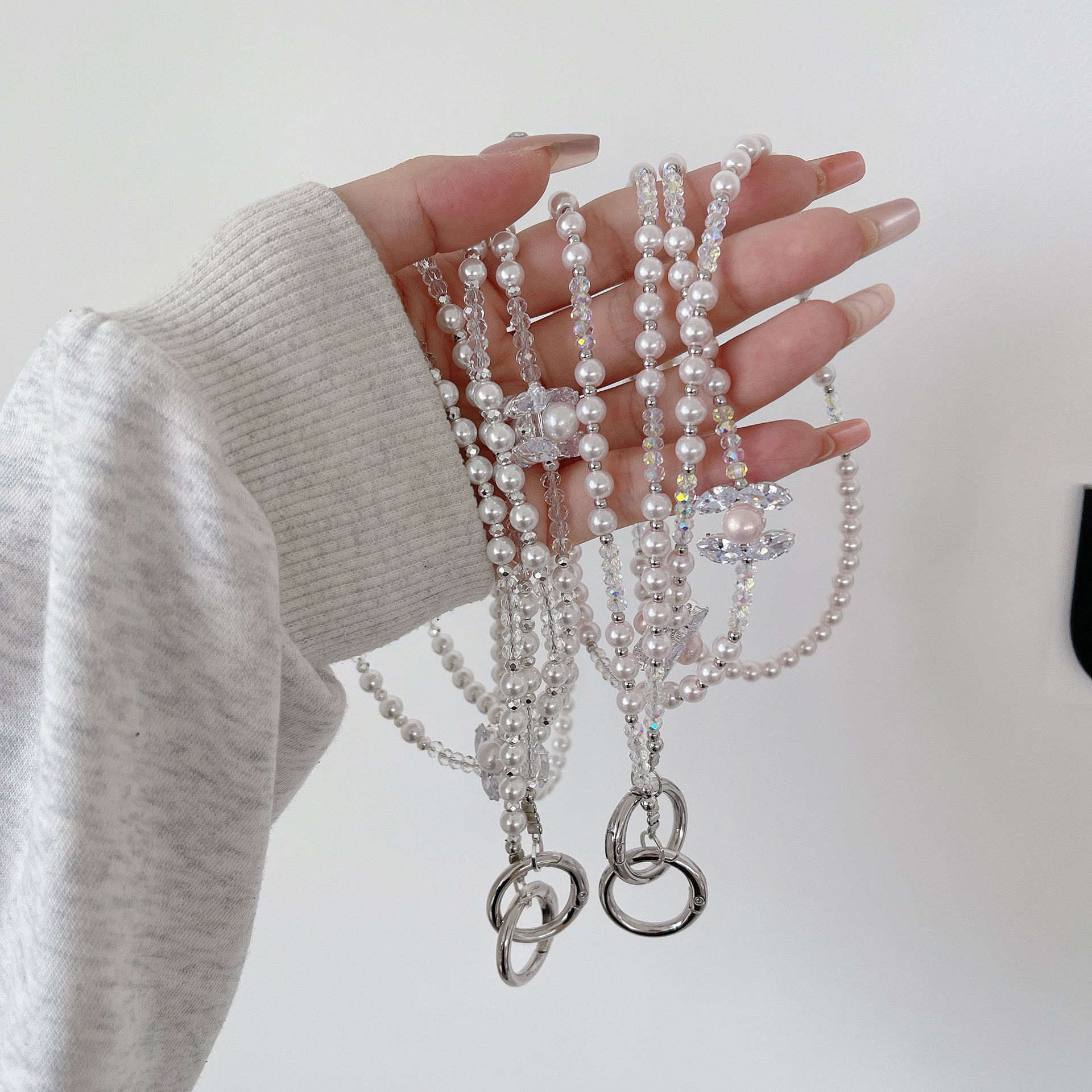 Cadena de teléfono móvil de alta gama hecha a mano de boutique, cadena larga de la serie Pearl Xiaoxiang, cordón de teléfono móvil de moda, colgante de mensajero largo