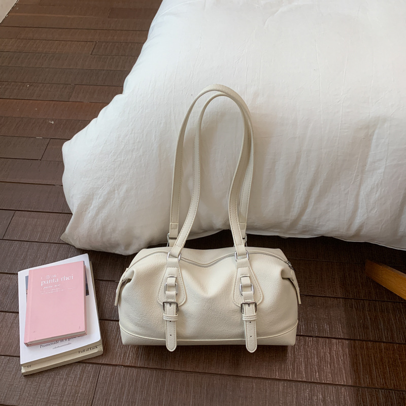 Bolsas de bolos de cuero suave de estilo extranjero, bolsas de brazales de diseño de tendencia, bolsas de viaje frescas para el trabajo.
