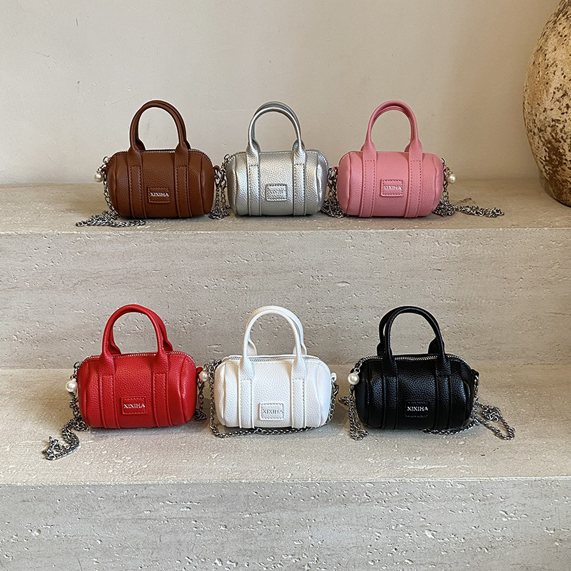 Coreano simple color sólido bolso de hombro para niños y niñas letras de aire extranjero mini bolso de bebé nuevo bolso de almohada para niños