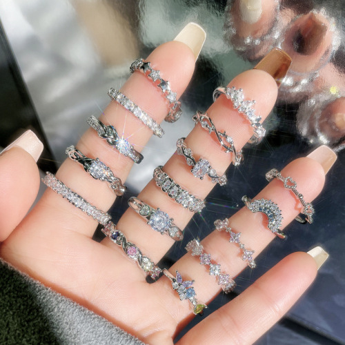 Delicate and small, minimalist open-mouthed ring with embedded zircons, unisex design, stackable and versatile fashion ring with a cool and indifferent style.
