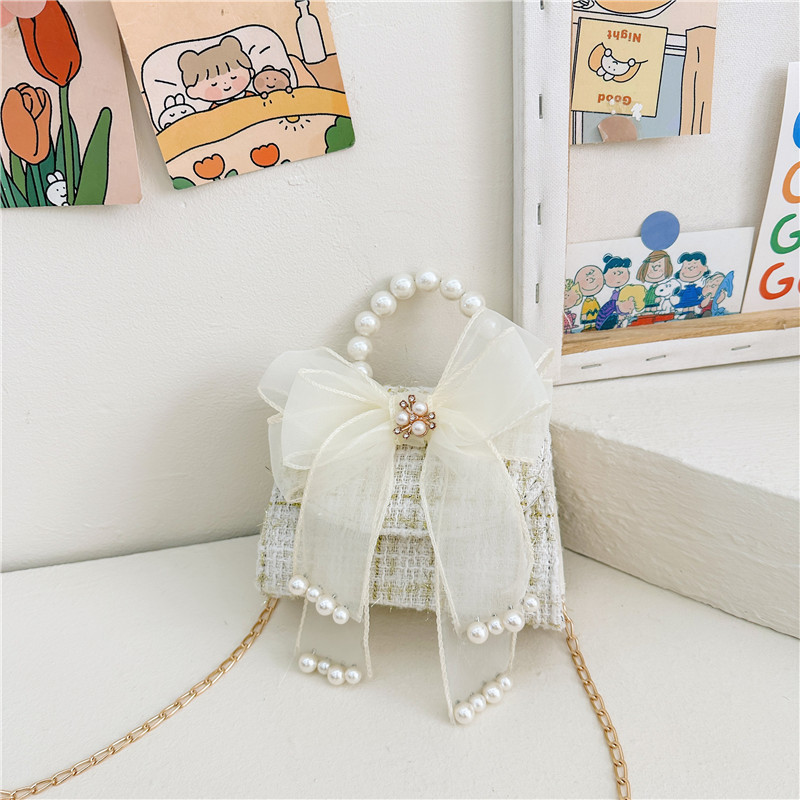 Bolsos de moda de moda para niños, arco de arco, nuevo bolso, cambio de chicas, mochila transfronteriza