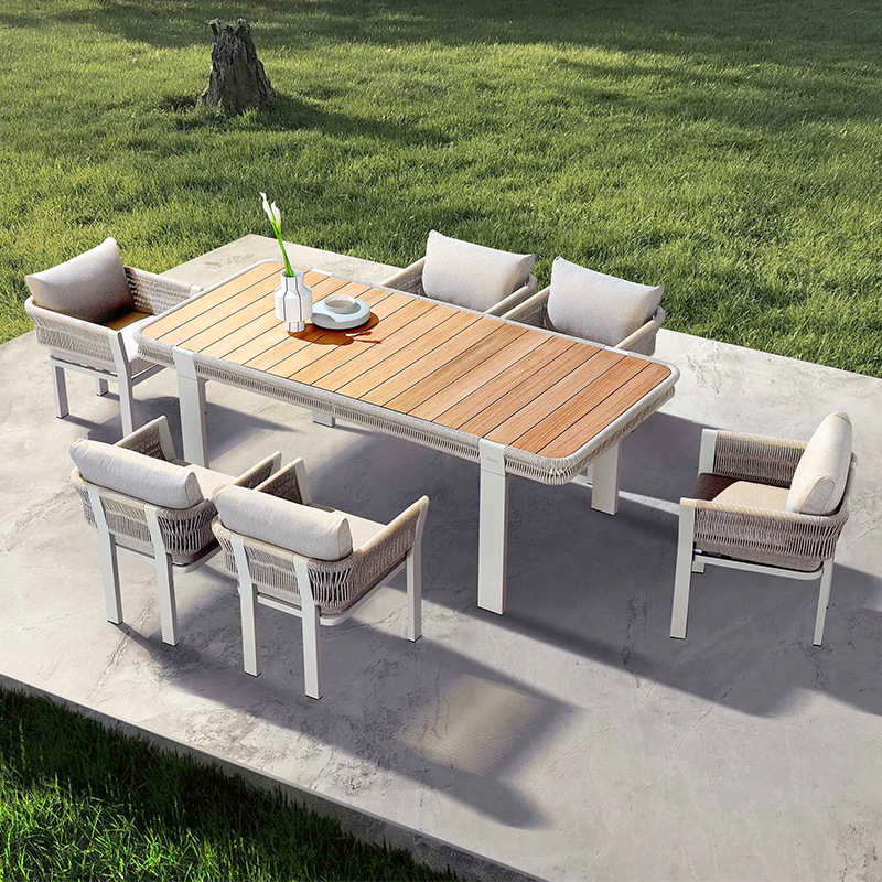 Mesa y silla de ocio al aire libre patio villa jardín combinación de tela de caña hotel residencial terraza al aire libre silla de caña impermeable image 1