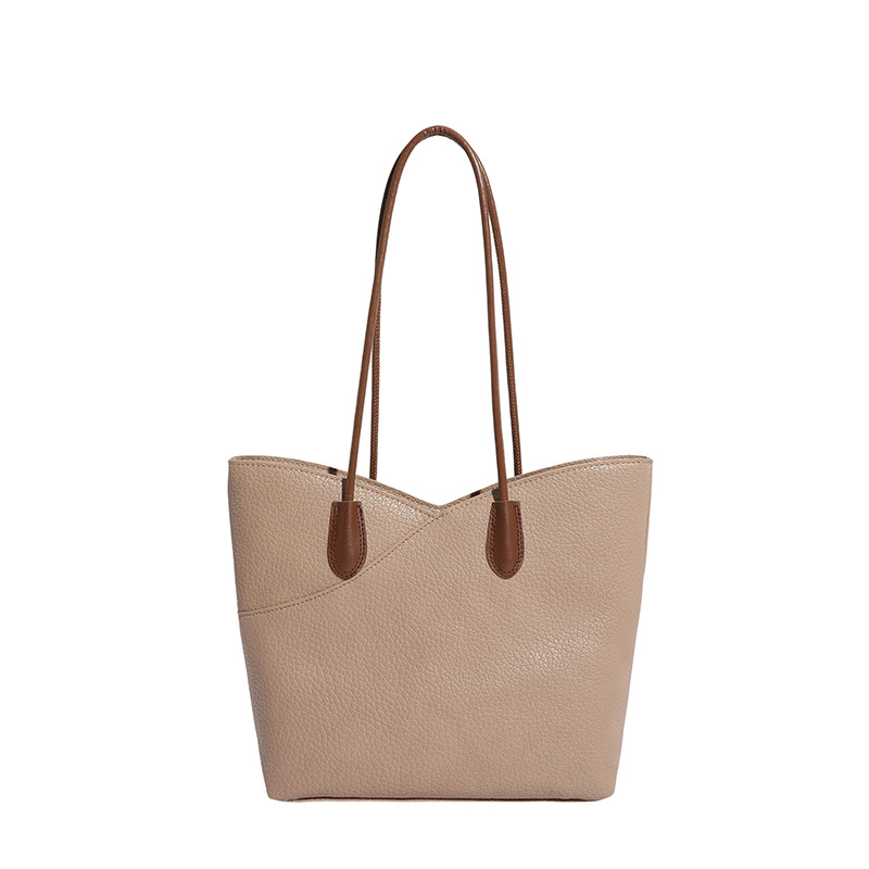 Bolsa de mano de textura superior para mujeres 2026 nicho transfronterizo bolso de hombro ligero de lujo de gran capacidad de viaje a la braza