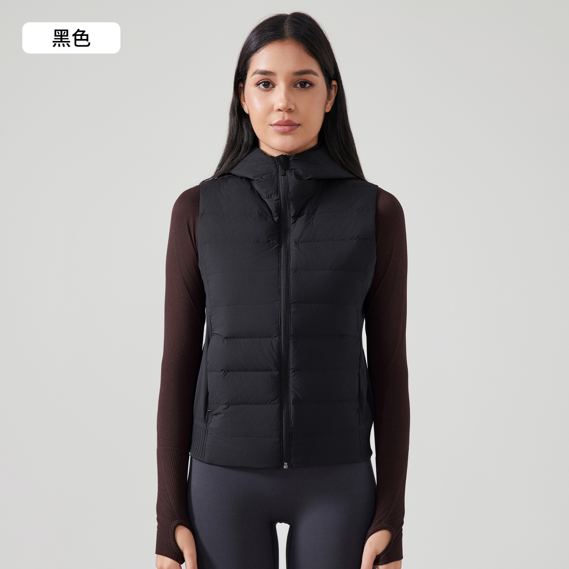 Exportación de comercio exterior Europa y América chaleco de pluma con capuchón caliente ligero de moda universal hombro deportivo de bicicleta chaqueta de fitness