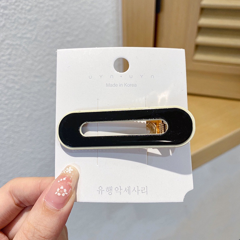 10#검은색 타원형 머리핀
