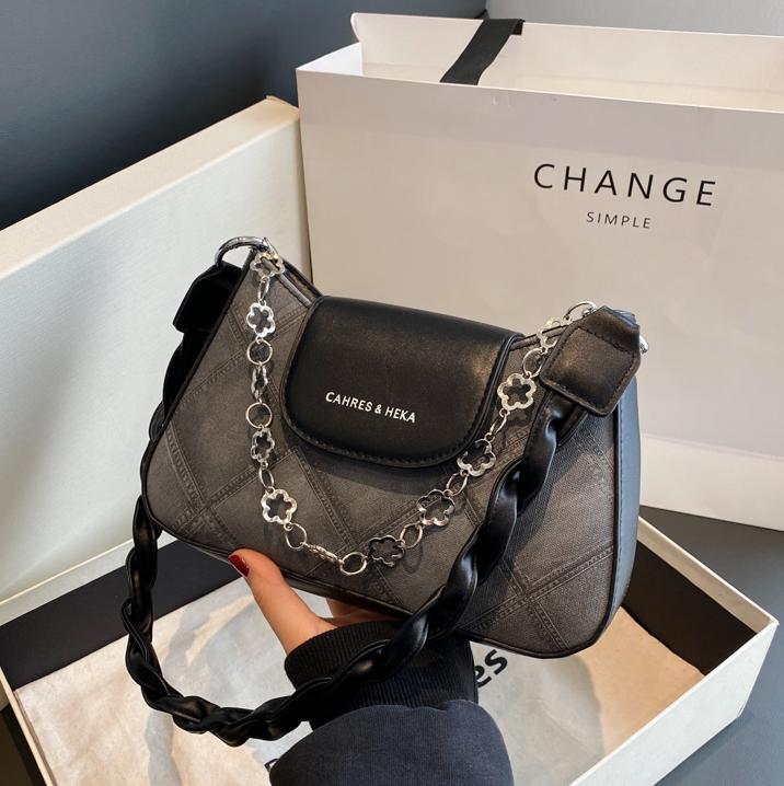 Este año popular nicho residuos de bolsas 2025, nuevo bolso de mujer, bolso de hombro retrógrado, bolso de brazo pequeño