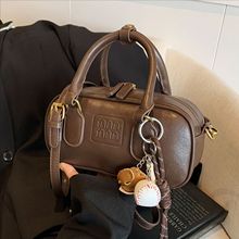 感手提保龄球包包女2025春季新款潮小方包大容量通勤包斜挎包