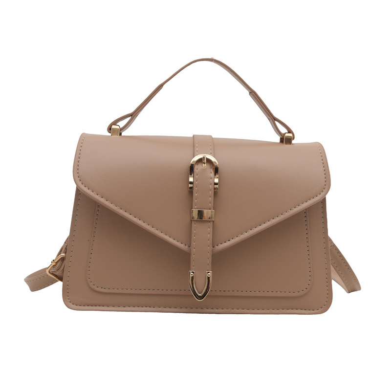 Diseño de nicho femenino 2025 primavera nueva moda simple bolso de mensajero de un solo hombro hebilla de cinturón bolso cuadrado portátil de cercanías