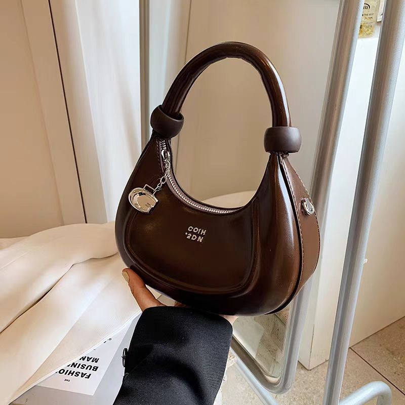 Women's Underarm Handheld Saddle Bag New Designer High-End Niche Retro Versatile Shoulder Crossbody Bag_voghion.com