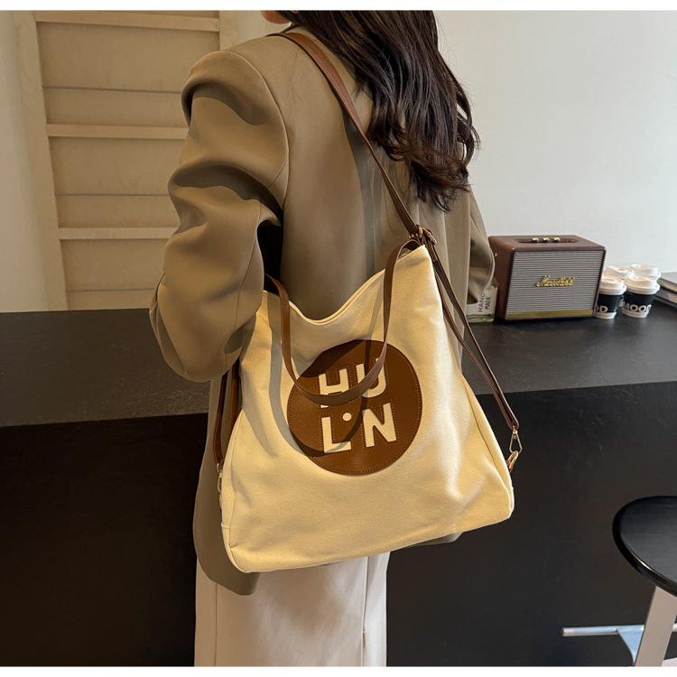 Korean letter printed multi-purpose cloth bag, 2024 new style, high-quality student backpack, commuting single-shoulder bag undefined