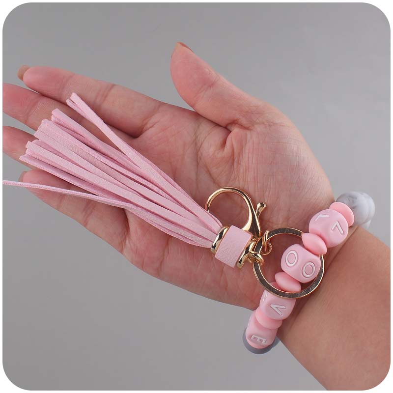 Nuevo cuero pu borla colgante llavero creativo DIY nombre cuentas de silicona con cuentas contraste color colgante llavero