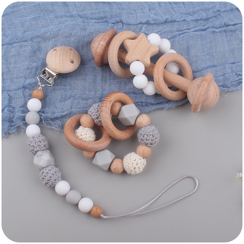 Nuevos suministros para bebés Beech clip chupete cadena calmante bebé pulsera mordedor estrella sonajero conjunto de tres piezas