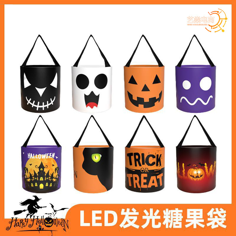 国境を越えた新しい発光ハロウィーンは砂糖袋を求めて、ランプ付きカボチャ発光筒パーティー装飾キャンディー袋を持っている|undefined