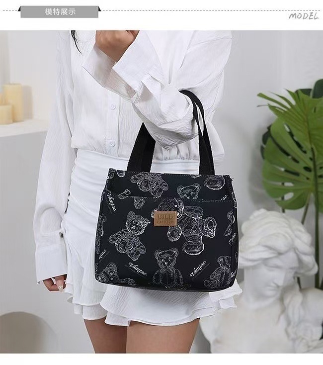 New handbag bento for mommy and office workers. Oxford cloth with rice for work. Fashionable lunch box with large capacity undefined