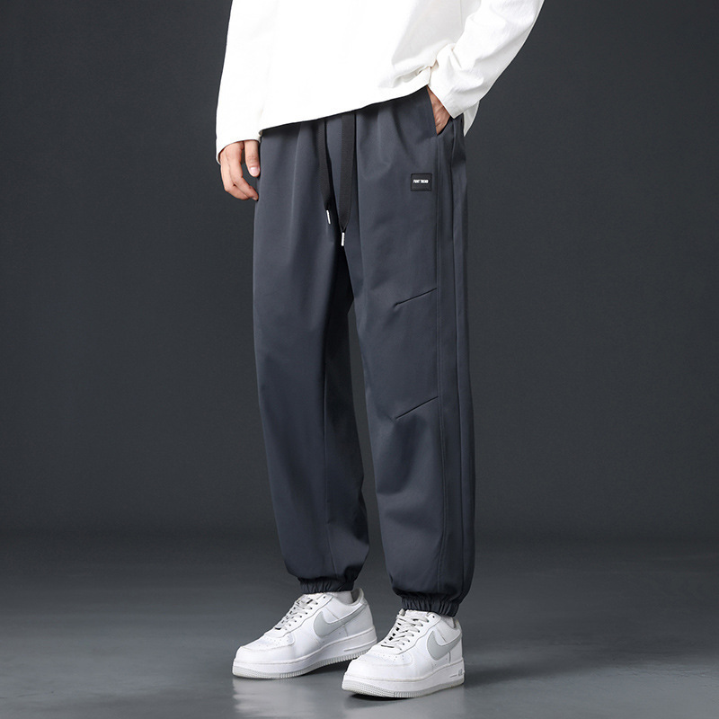 Pantalones de hombre primavera y otoño estilo americano de moda universal suelto y cómodo chaqueta deportiva, pantalones casuales para hombres