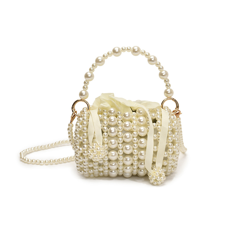2025 nuevo bolso para niños fresco dulce perla trenzada bolso de hombro para niñas mini bolso de almohada para niños