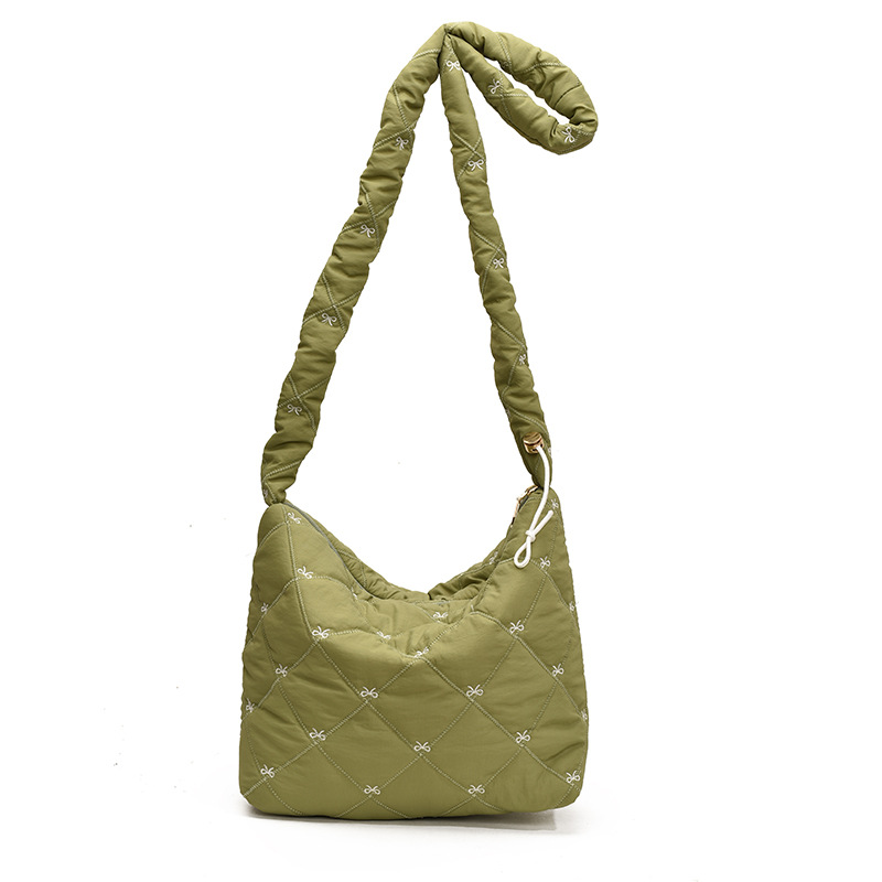 Otoño y invierno de gran capacidad para mujeres 2024 nuevo diseño de arco de bordado ligero de hombro mochila de viaje bolsa