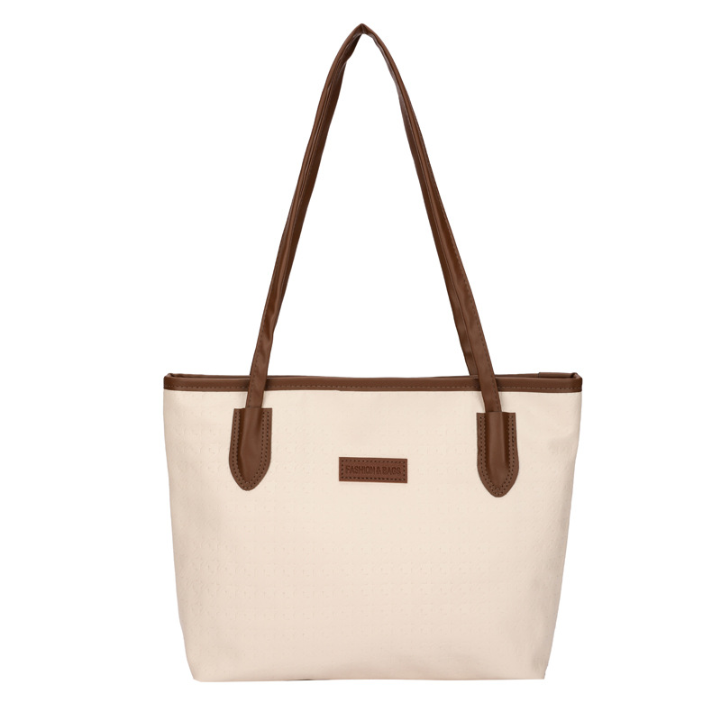 Bolsa de gran capacidad para mujeres 2024 nueva bolsa de hombro de trabajo casual, sensación avanzada de estudiantes universitarios en clase, bolsa de viaje