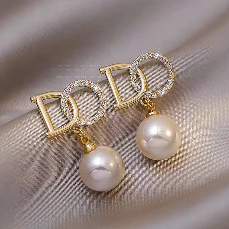 43 # Letter d pearl diamond earrings