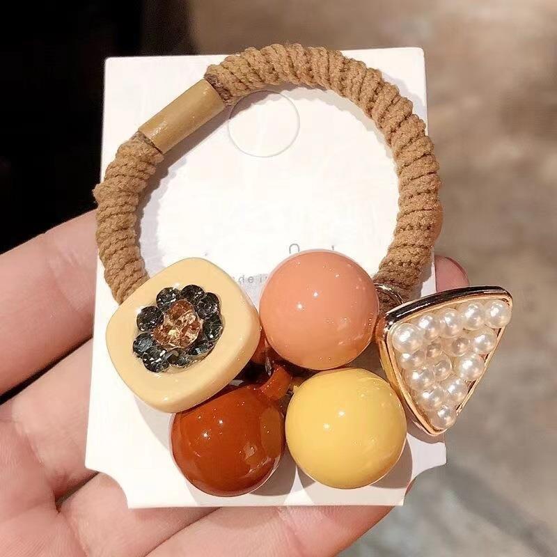 Elástico joyas de cabello de moda con frijoles frescos M anillo de cereza cuerda de cabello al por mayor de la banda de goma cabeza de 100 bolas de cabello rojo una variedad de alta elástica