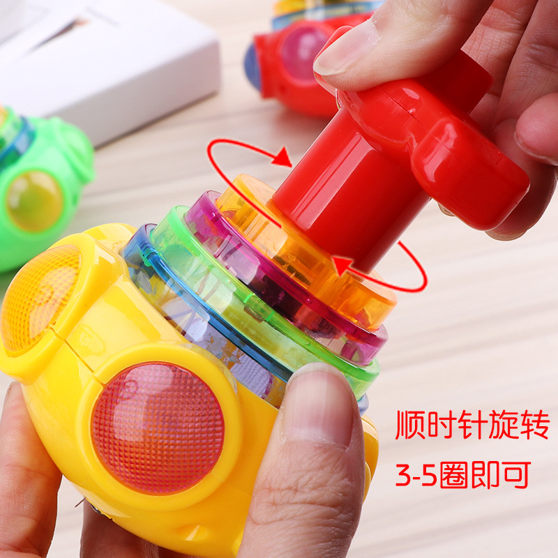 Juguete giroscópico para niños música ligera giroscopio giratorio niños y niñas 4-8 años puesto de parque regalos al por mayor