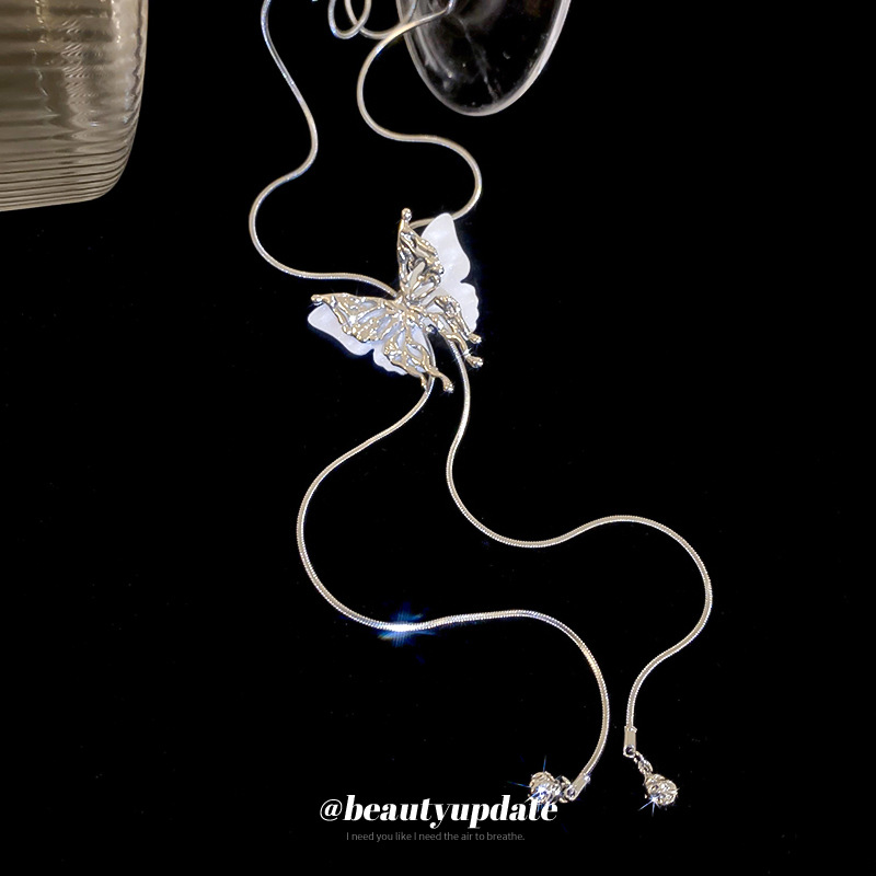 Collar de borla de mariposa ajustable de estilo largo de alta gama, cadena de clavícula de todo fósforo de moda, nuevo estilo transfronterizo, joyería de lujo ligera para mujer