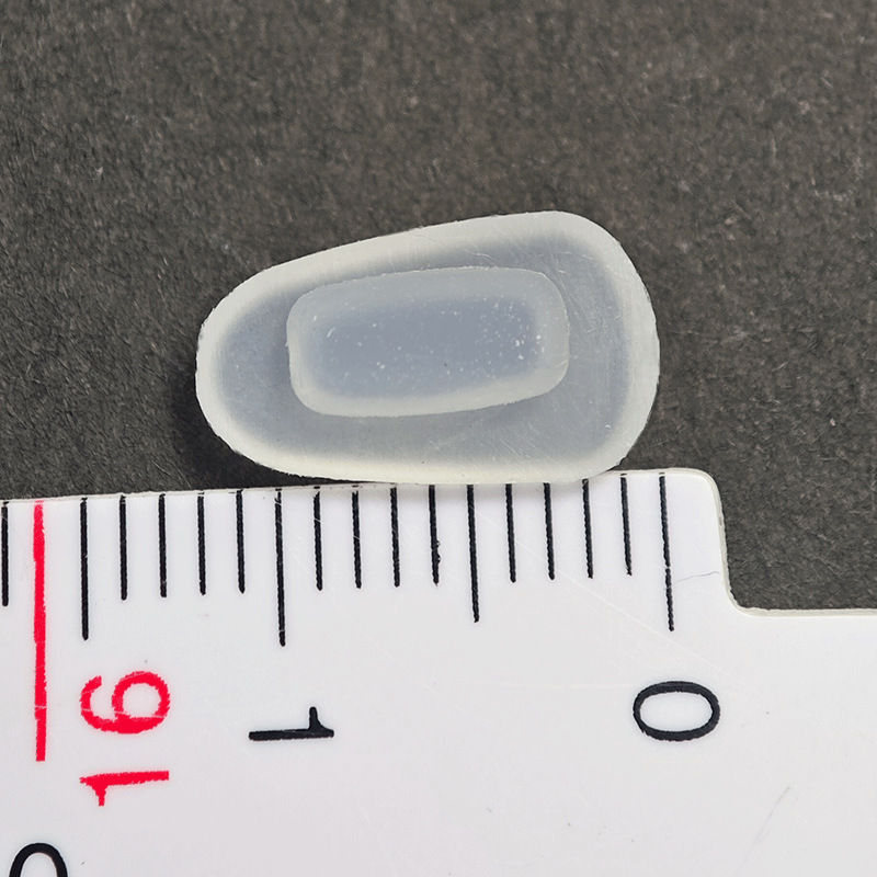 突っ込み式のメガネの鼻の支えの部品の目のフレームの鼻の当てのカバー式の柔らかいシリカゲルの葉のつや消しの水滴型の楕円形|undefined