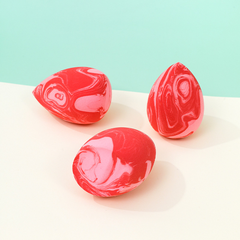 Gota de agua en forma de calabaza maquillaje de belleza de huevo soplo de polvo color mezclado sin látex maquillaje esponja colchón de aire maquillaje huevo fábrica color personalizado