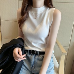 春夏ニットストラップベストの女性はフランス風のユニークなインナーに半高襟のシャツを着て、袖のない上着を身に着けています。