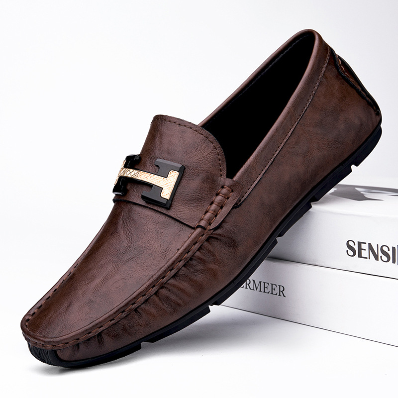 Zapatos de hombre de cuero real 2025 nuevos zapatos de negocios británicos transpirables con suela suave zapatos casuales perezosos con un pie zapatos para hombre