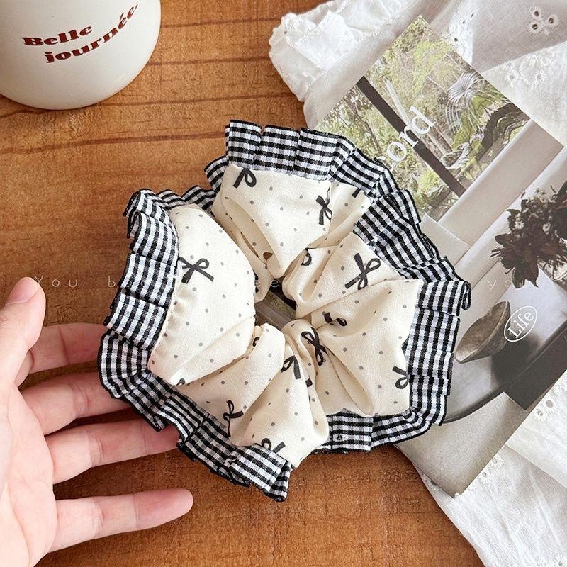 Correa coreana arco de mariposa intestino 2025 cabello anillo de cabello de cabello de cola de cabello de la niña decoración de invierno invierno decoración de invierno