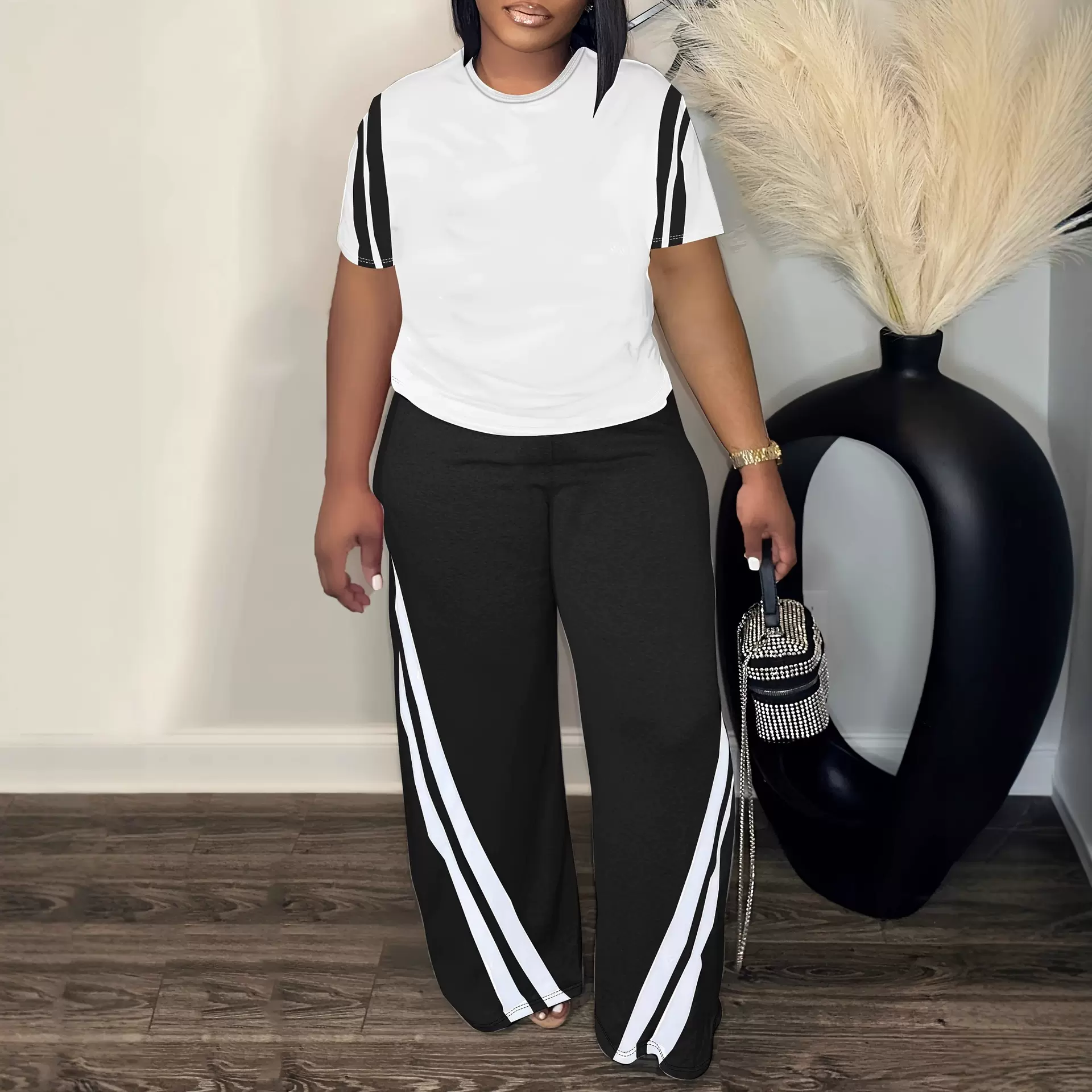 亚马逊欧美女式时尚宽松印花条纹百搭两件套圆领短袖上衣和裤子