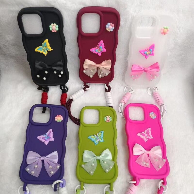 Suitable for Apple 16Pro Beautiful Colorfulful Wavy Edge Bow Pearl Butterfly Flower Wristband Lanyard Mobile Phone Case