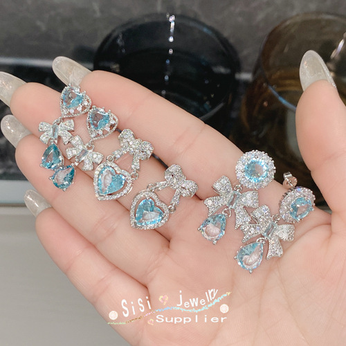 SIsi heavy industry light luxury bow love earrings gold-plated micro-inlaid imitation aquamarine niche super fairy temperament earrings