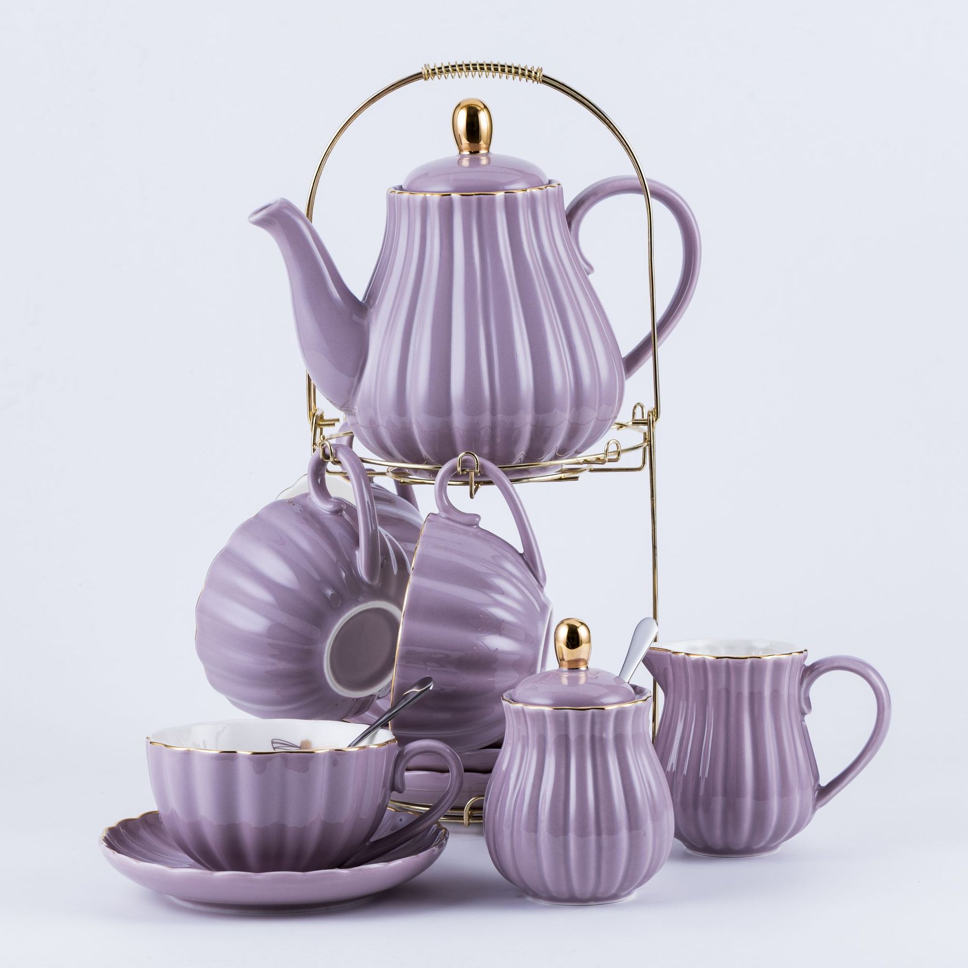 Rayas de abeja dorada Una olla de cuatro tazas Plato de café japonés Juego de tetera fría Juego de esmalte de color y té de flores doradas Cerámica