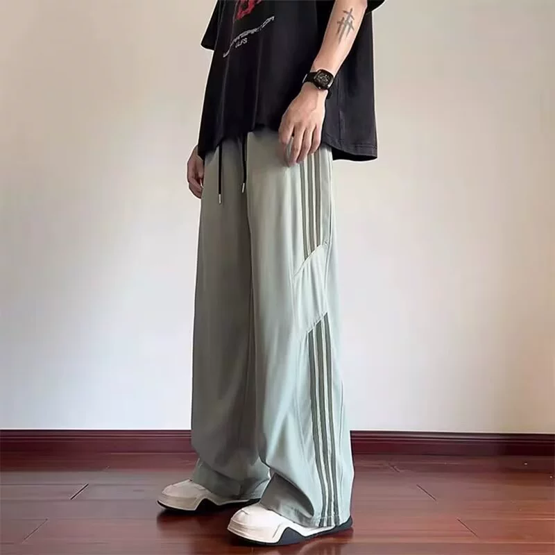 Лето 2025, новые полосатые брюки в американском стиле, спортивные брюки, прямые модные брендовые свободные повседневные молодежные брюки с широкими штанинами