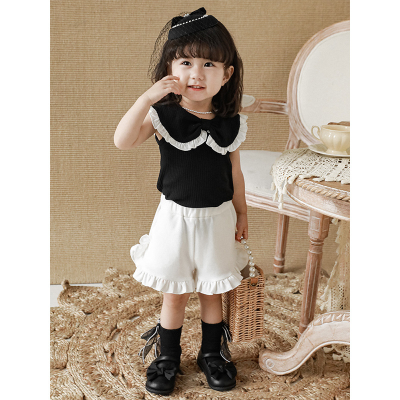 Qiududo niños lindos arco grande collar chaleco verano 2024 nuevas niñas lindo bebé chaleco fino