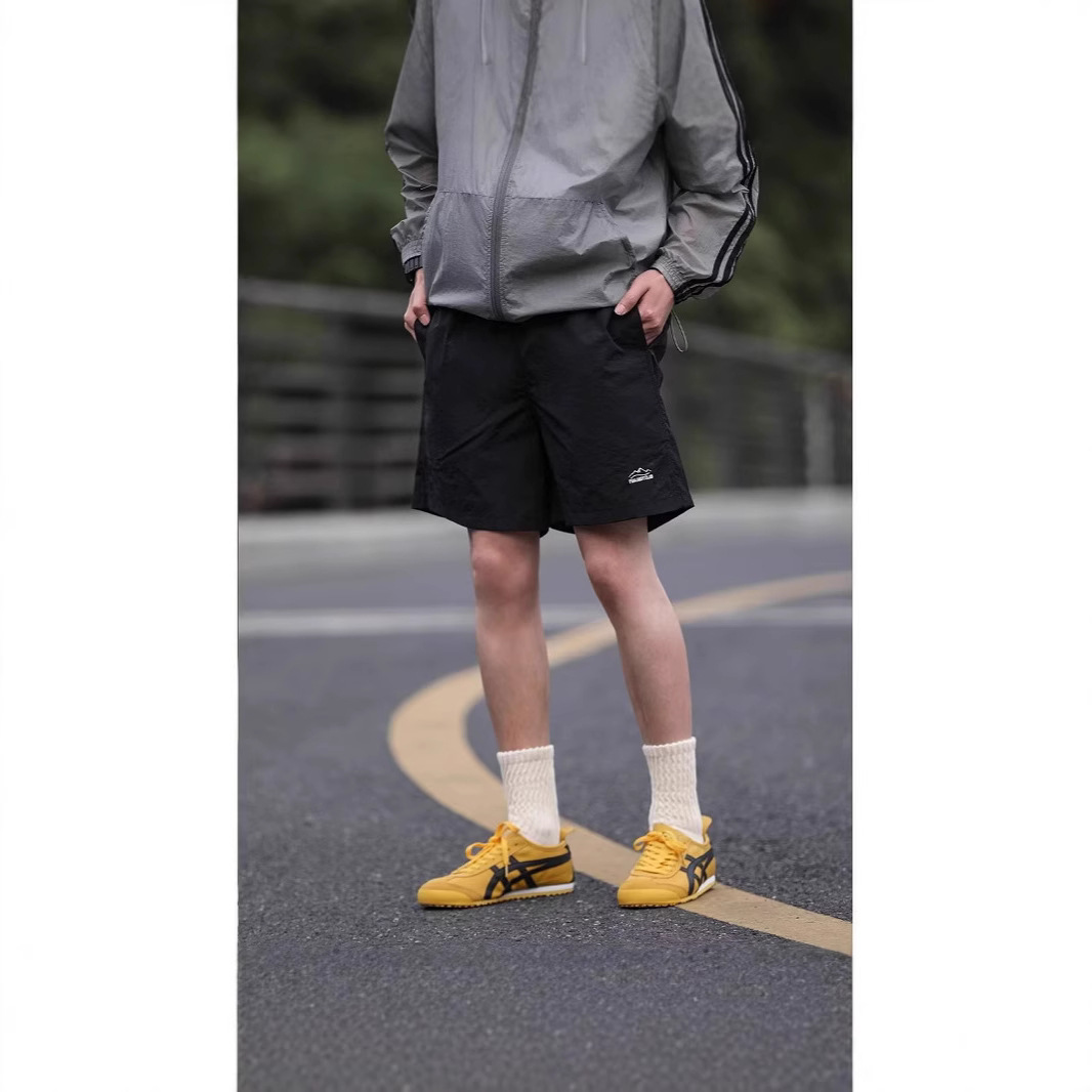 Summer Japanese travel solid color quick dry sports shorts for men…